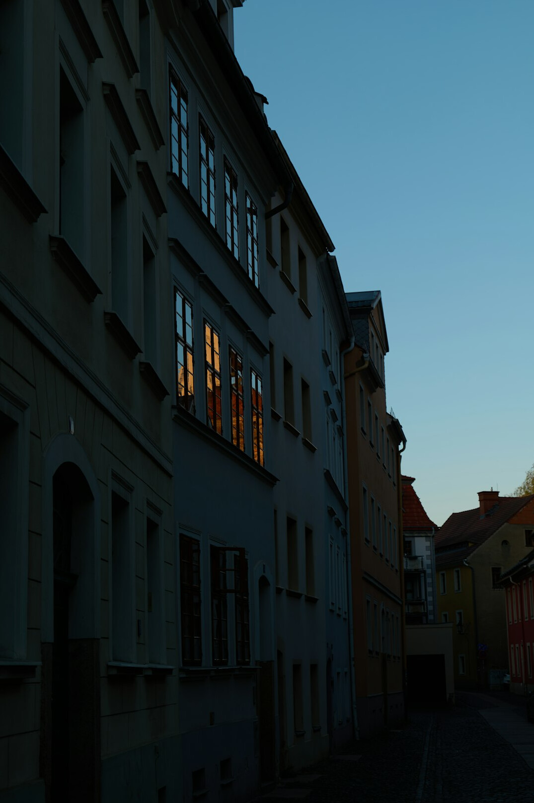 Quiet old city street at dusk