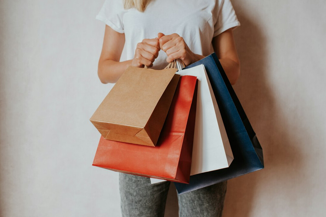 person hiding item in bag