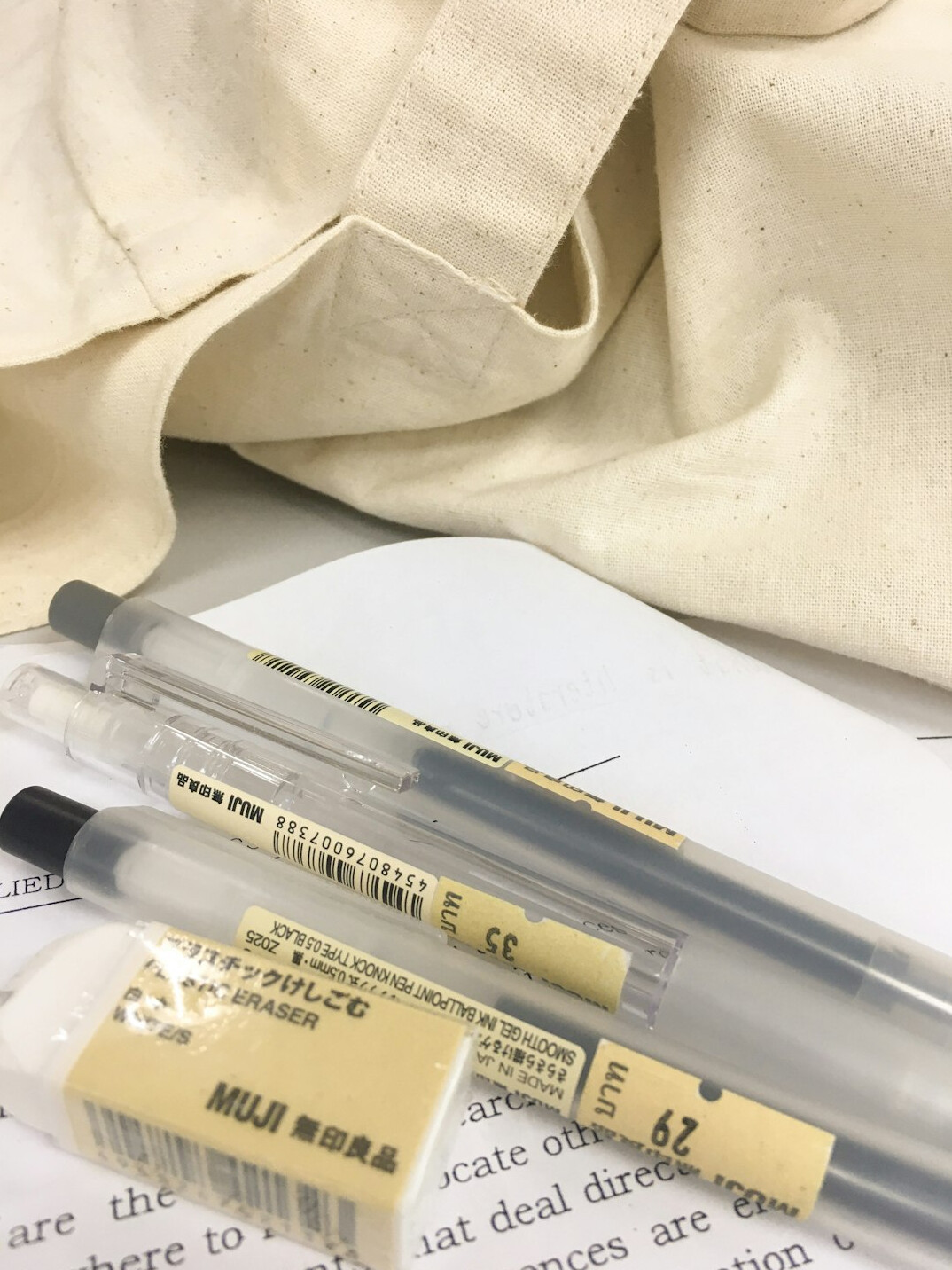 Pen and papers on a desk during research