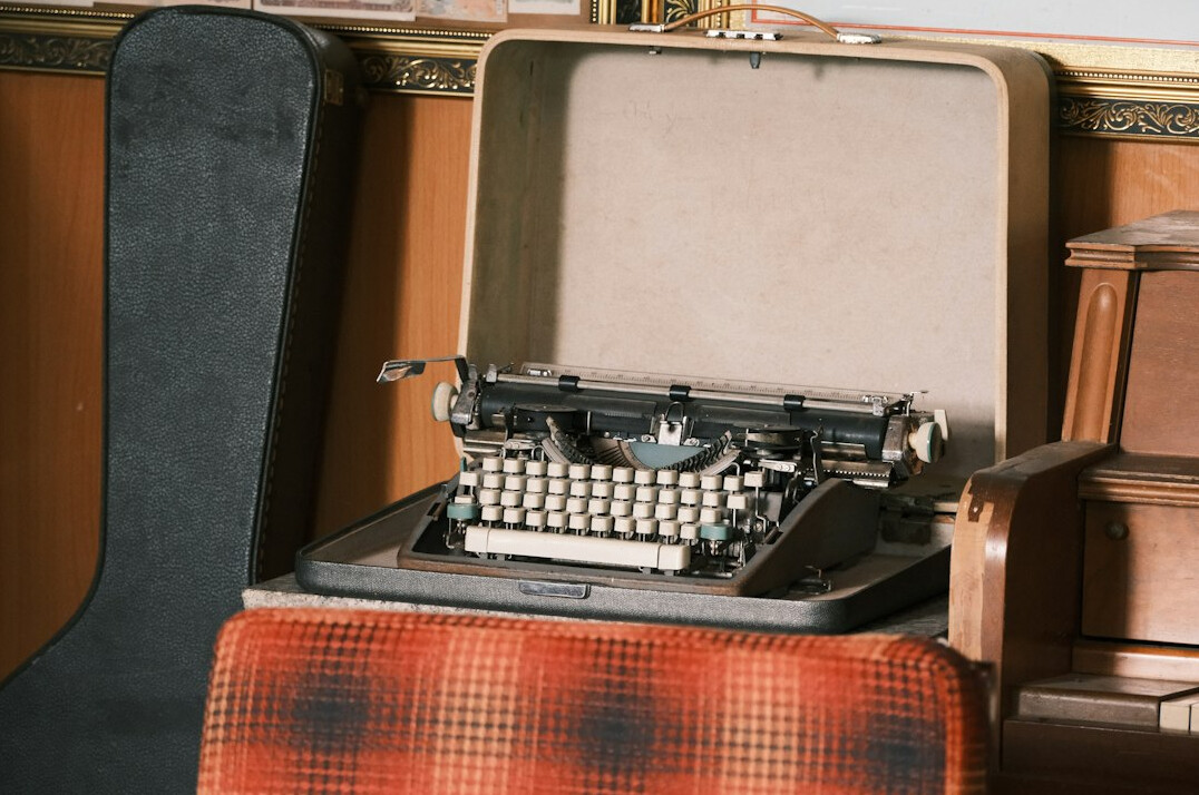 Vintage typewriter with a sheet of paper