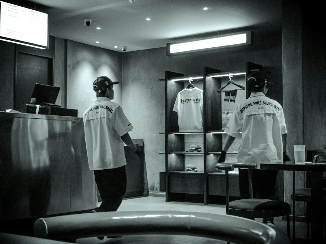 store detective observing suspects